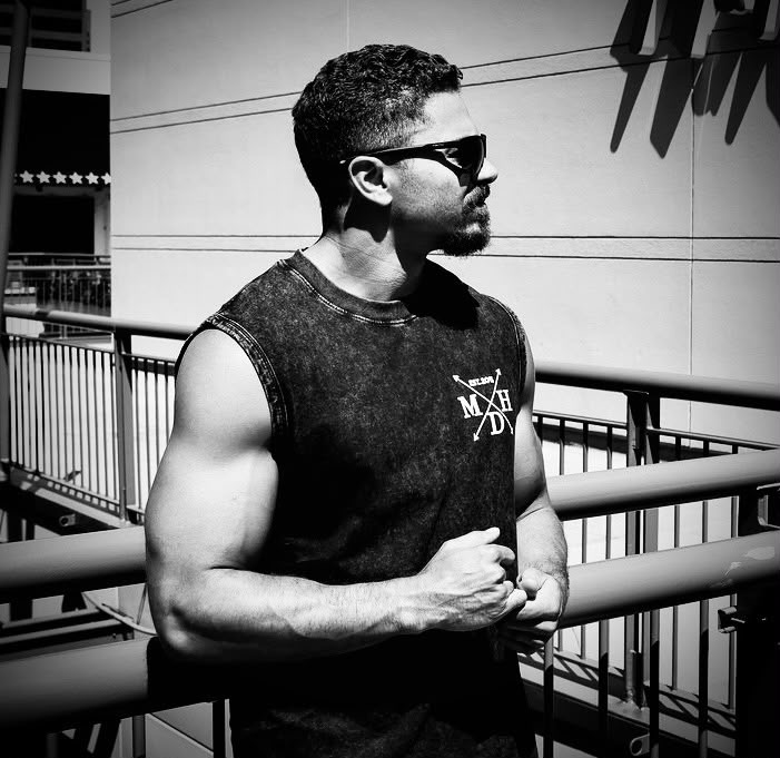 Robbie Ford in a black sleeveless shirt